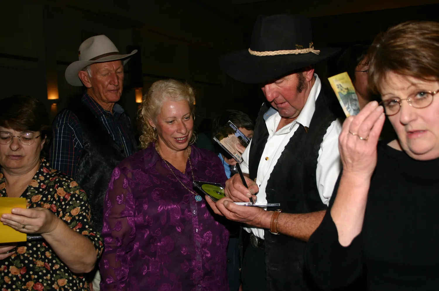 Ernie Constance signing CDs for fans